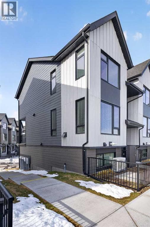 4 bed 3 bath single family at 319, 85 Sage Hill Heights NW — $575,000