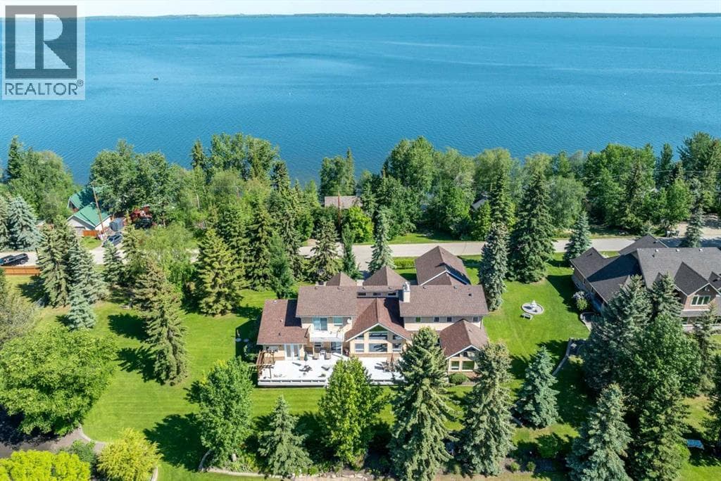 6 bed 5 bath single family at 248 Lakeshore Drive — $989,000