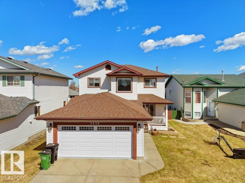 3 bed 3 bath single family at 5320 156 AV NW — $499,800