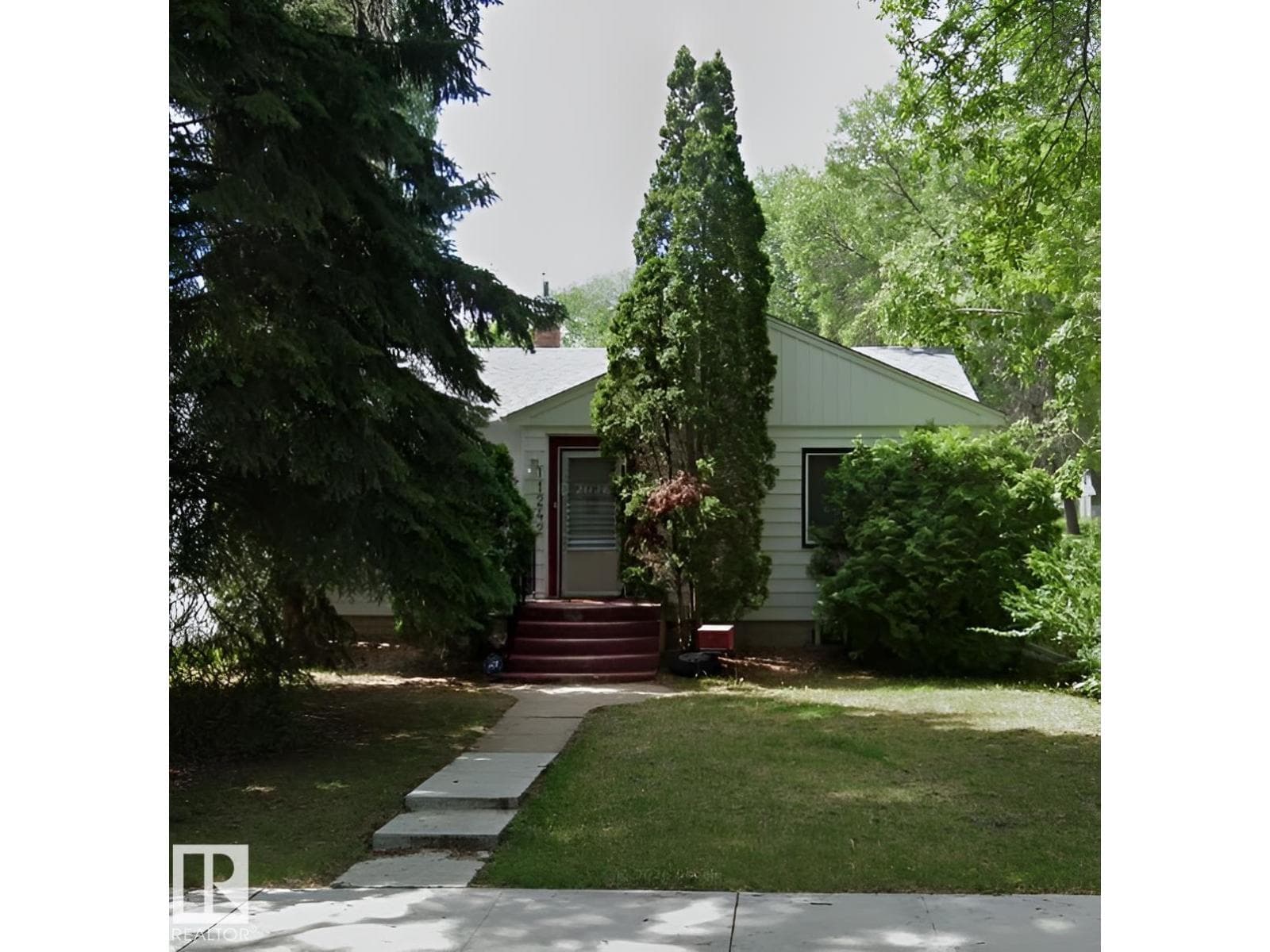 4 bed 2 bath single family at 11242 56 ST NW — $420,000