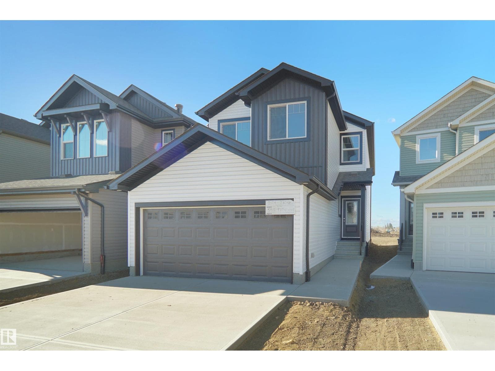 3 bed 3 bath single family at 1928 210 ST NW — $608,998