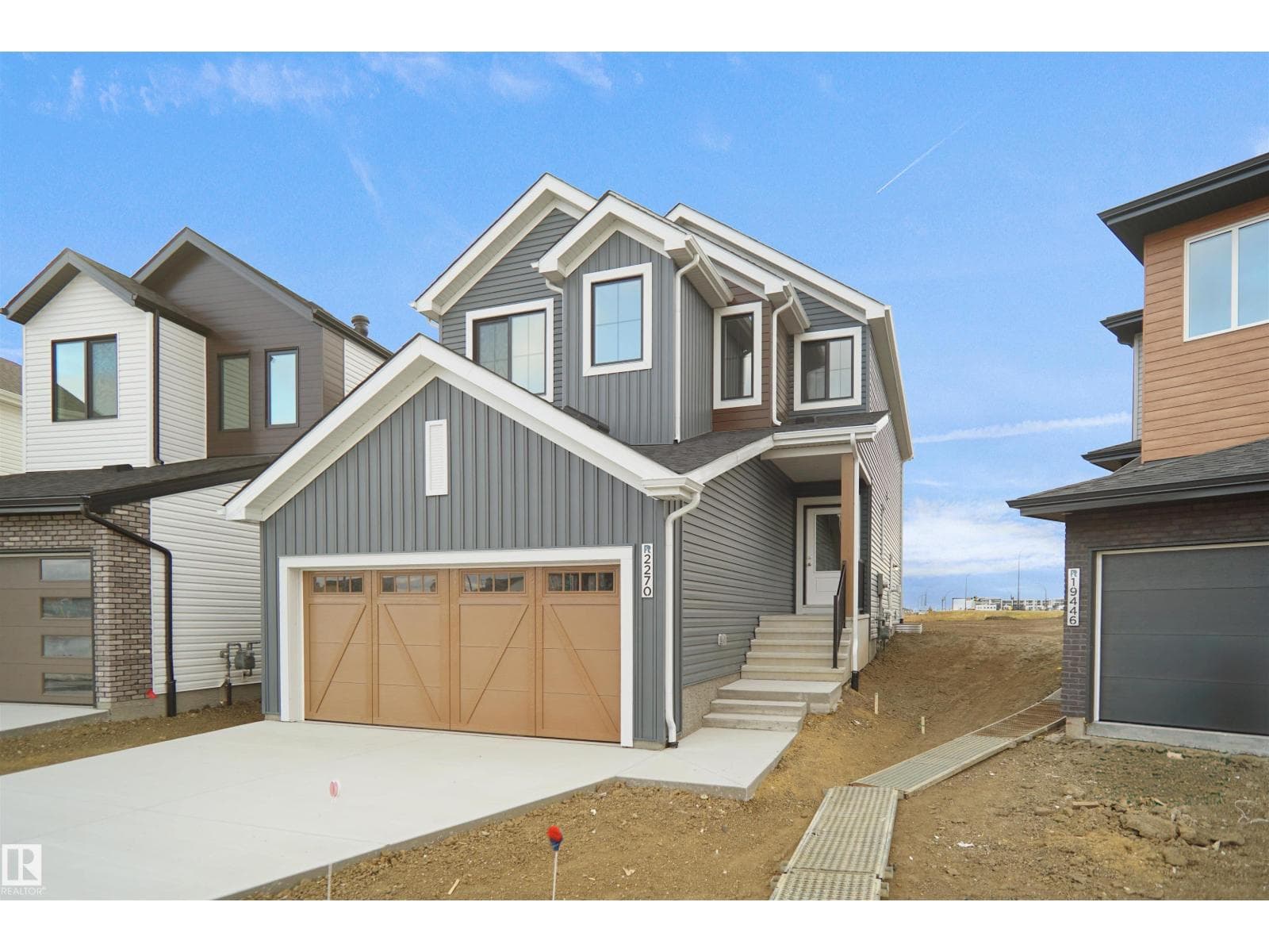 4 bed 3 bath single family at 1932 210 ST NW — $609,998
