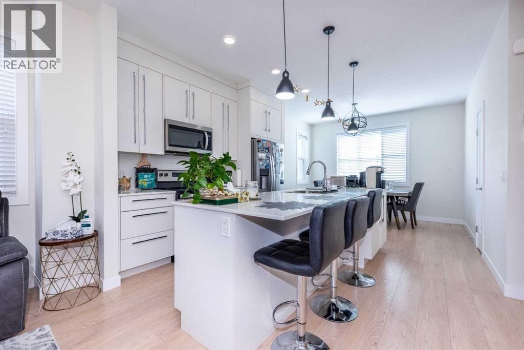 4 bed 3 bath single family at 412, 30 Cornerstone Manor NE — $409,000