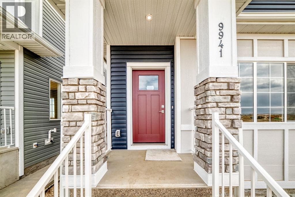 4 bed 4 bath single family at 9941 Huxley Drive NE — $659,900