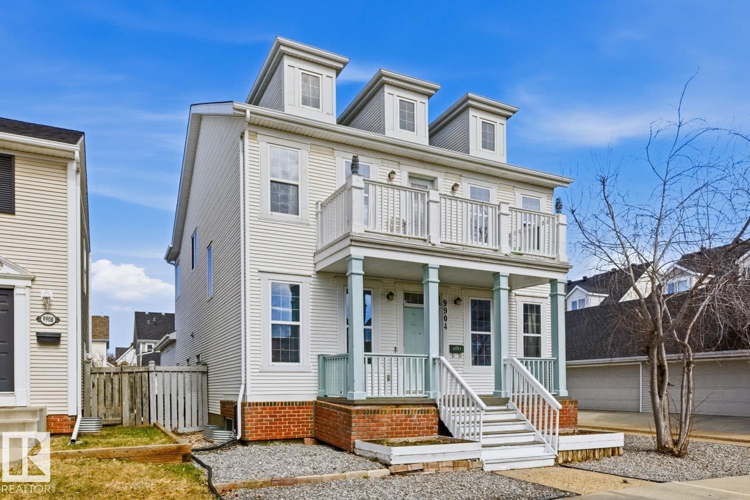 4 bed 4 bath single family at 9904 144 AV NW — $609,900