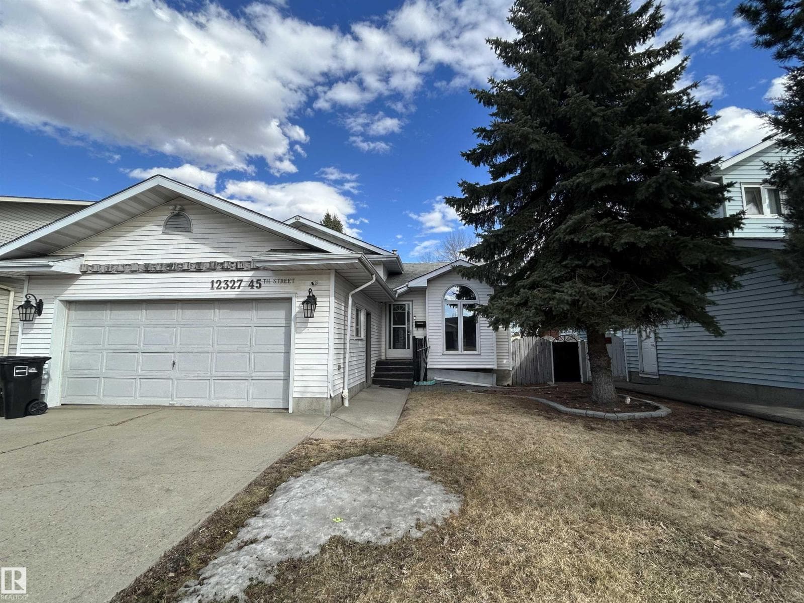 4 bed 3 bath single family at 12327 45 ST NW — $400,000
