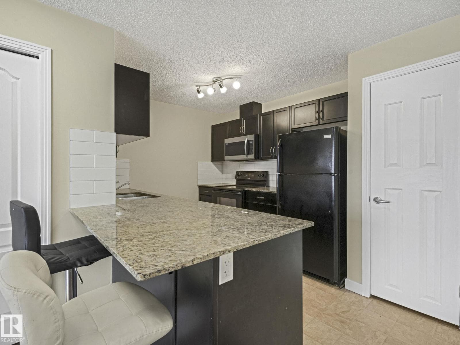 #317 12650 142 AV NW photo 5
