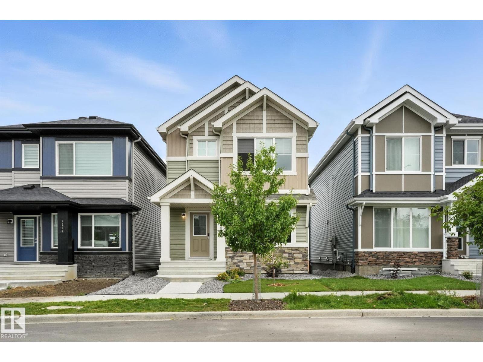 4 bed 4 bath single family at 6260 175 AV NW — $539,000
