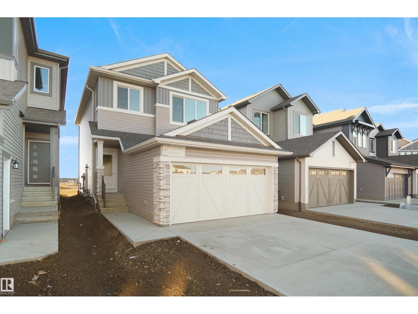 3 bed 3 bath single family at 2112 210 ST NW — $509,247
