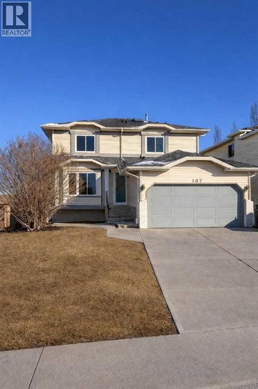 6 bed 4 bath single family at 107 Harvest Oak Crescent NE — $749,990