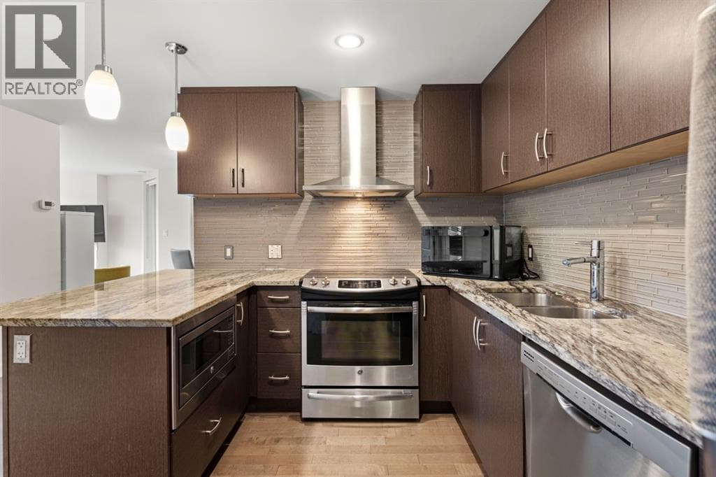 311, 303 13 Avenue SW photo 4