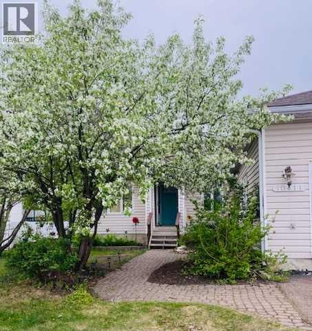 4 bed 3 bath single family at 10411 109 Avenue — $369,000