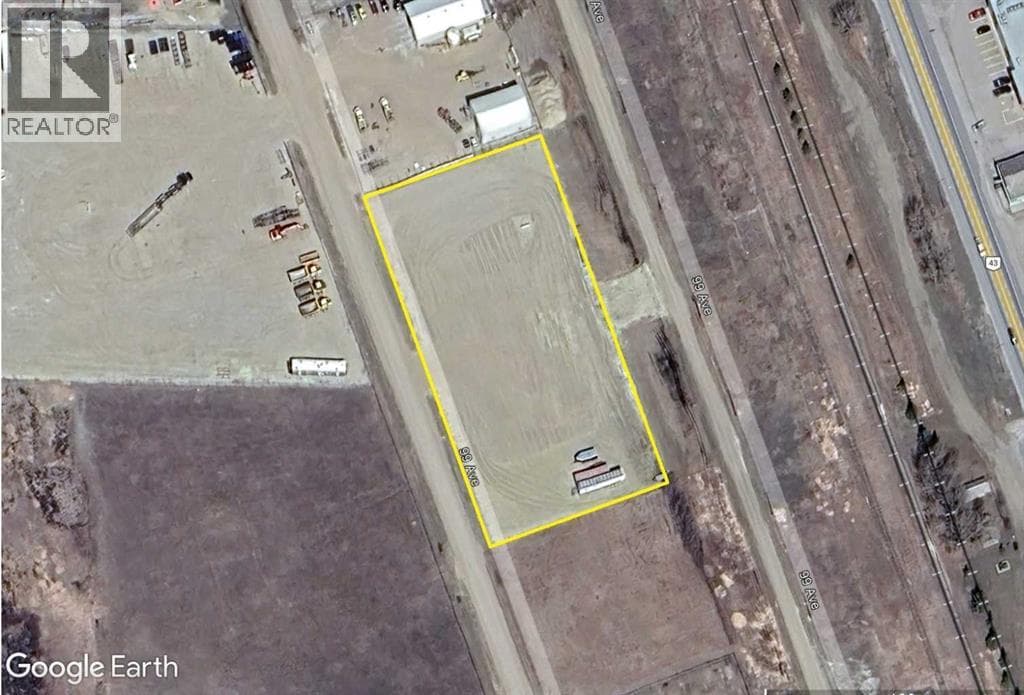 vacant land at 10008 99 Avenue — $129,900