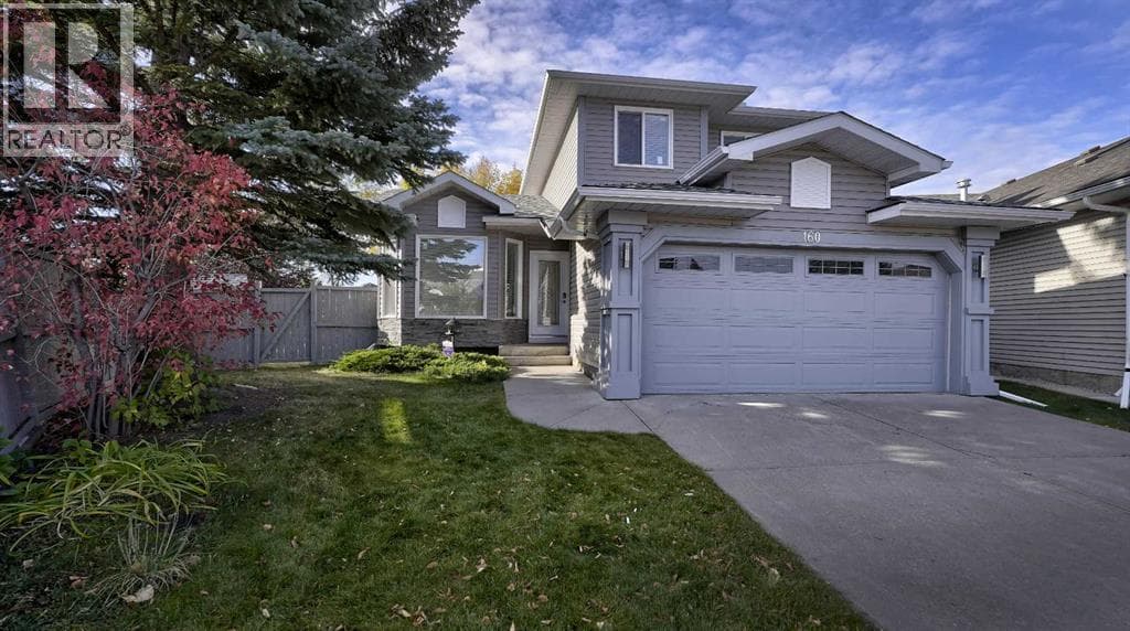 3 bed 3 bath single family at 160 Riverstone Crescent SE — $739,000