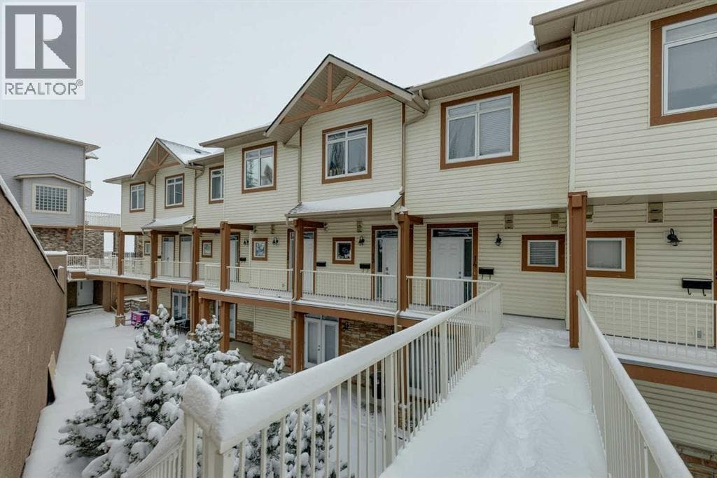 2 bed 3 bath single family at 14, 133 Rockyledge View NW — $329,900
