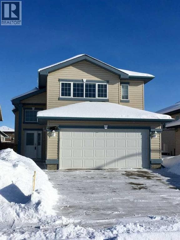 5 bed 3 bath single family at 10660 125 Avenue — $469,900