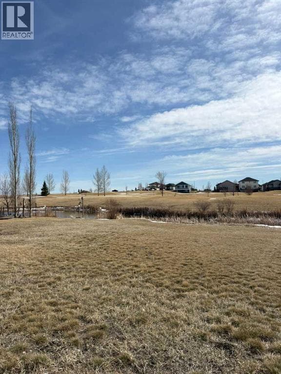 vacant land at 709 Whispering Greens Avenue — $45,000