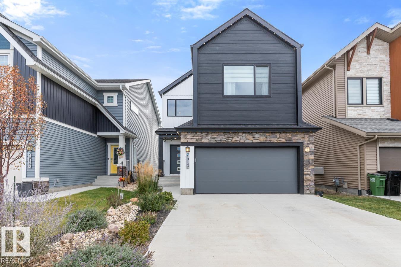 3 bed 3 bath single family at 19147 22 AV NW — $675,000