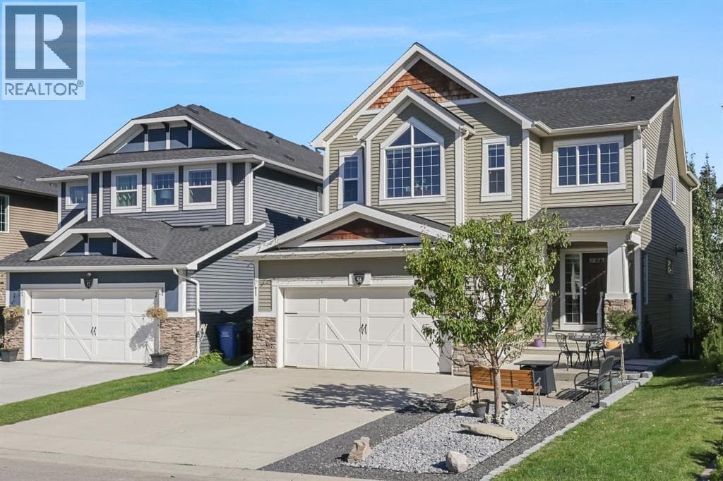 4 bed 4 bath single family at 56 Jumping Pound Rise — $789,000