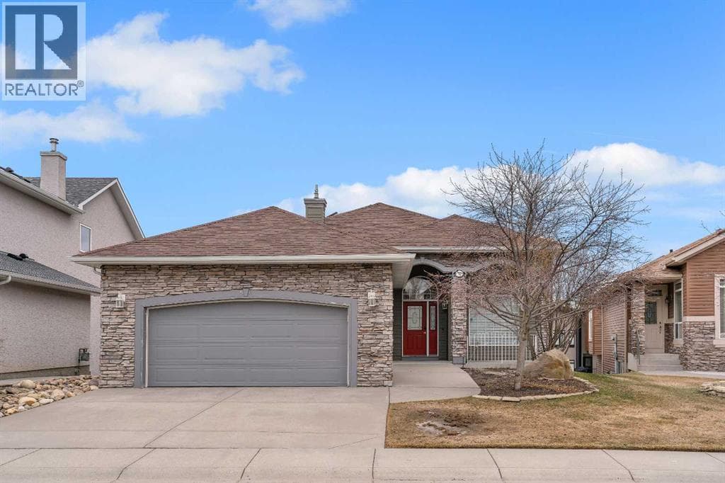 4 bed 3 bath single family at 56 Royal Abbey Rise NW — $1,100,000