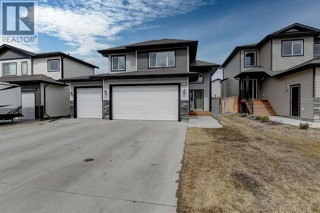 5 bed 3 bath single family at 10222 126 Avenue — $599,900