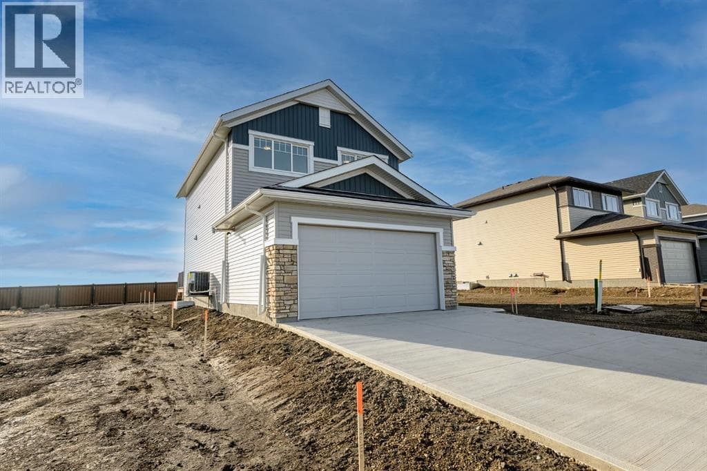 3 bed 3 bath single family at 12826 87A Street — $529,900