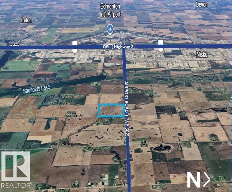 vacant land at 50099 RR 244 — $2,677,000