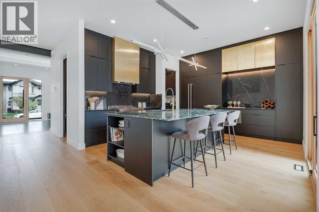 6 bed 5 bath single family at 517 28 Avenue NW — $2,095,000