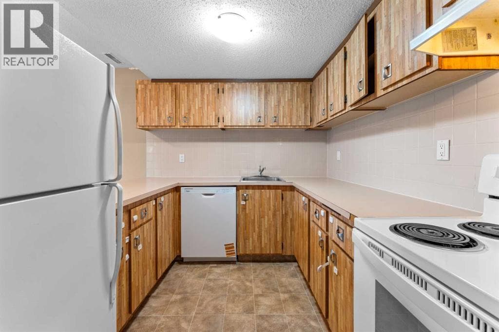 1202, 2200 Woodview Drive SW photo 4