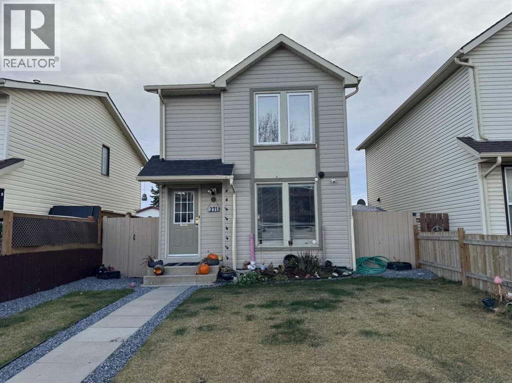 3 bed 3 bath single family at 371 Falshire Drive NE — $382,000