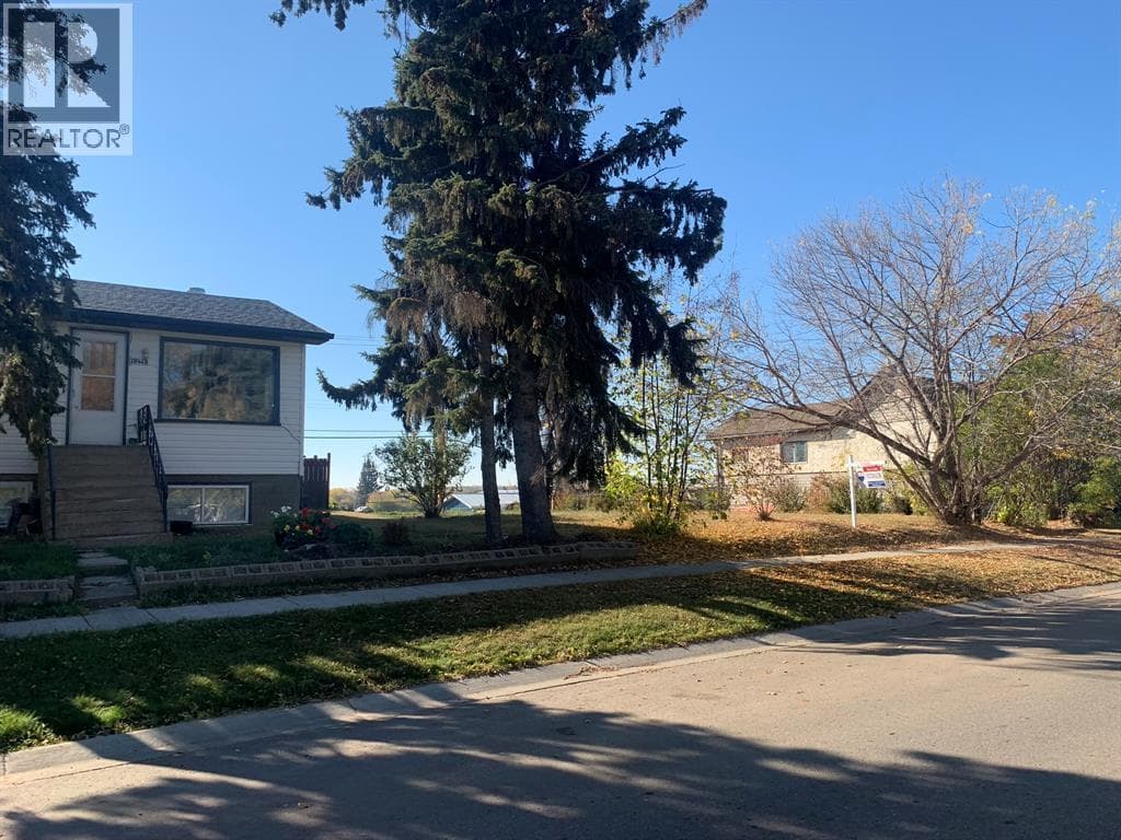 vacant land at 10415 101B Avenue — $64,500