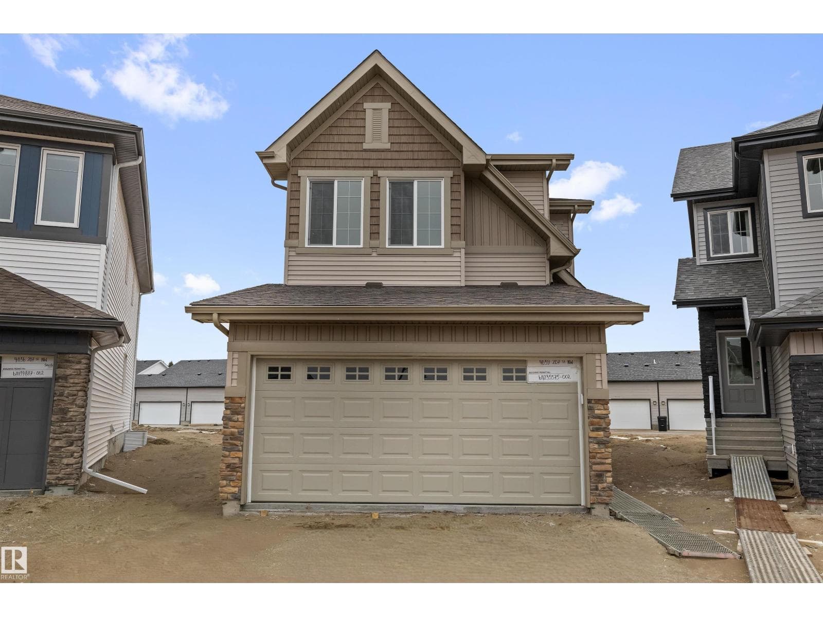 3 bed 3 bath single family at 4039 207 ST NW — $624,600