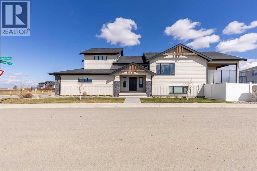 4 bed 3 bath single family at 648 Sixmile Crescent S — $939,500