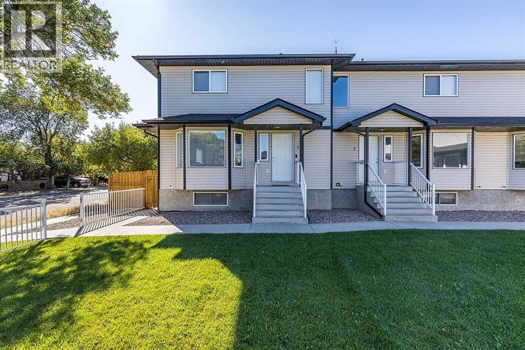4 bed 4 bath single family at 1, 115 3 Street NE — $274,900
