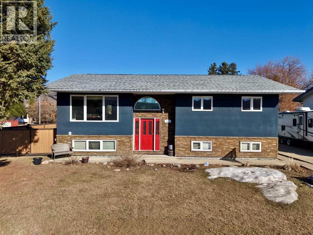 4 bed 3 bath single family at 7901 94 Street — $430,000