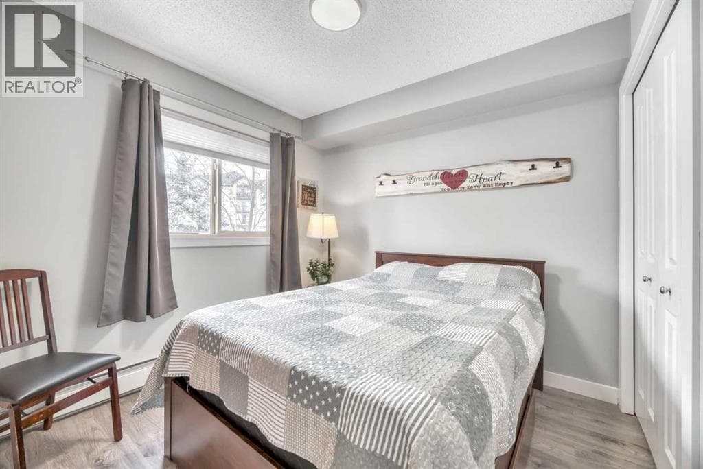 8109, 403 Mackenzie Way SW photo 2