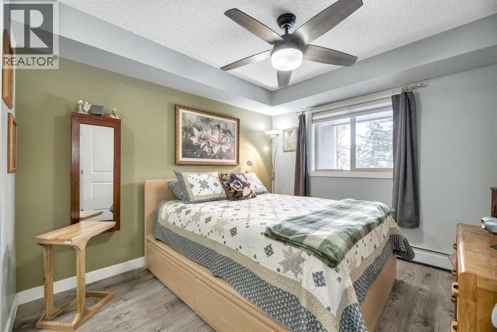 8109, 403 Mackenzie Way SW photo 3