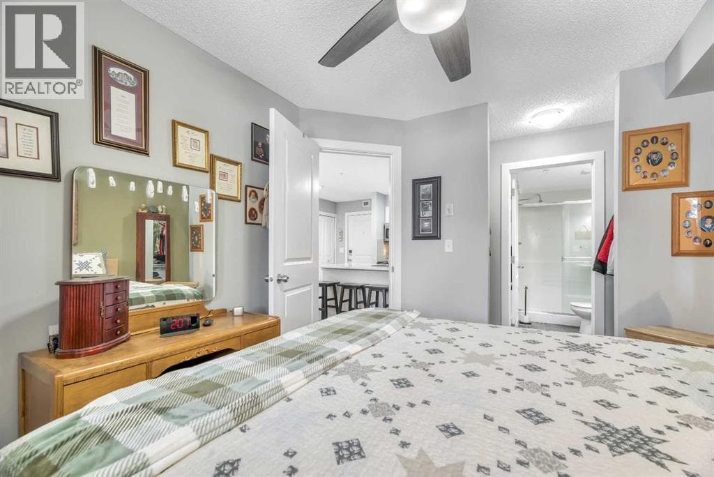 8109, 403 Mackenzie Way SW photo 4