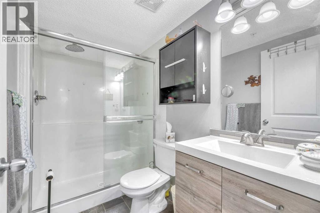 8109, 403 Mackenzie Way SW photo 5