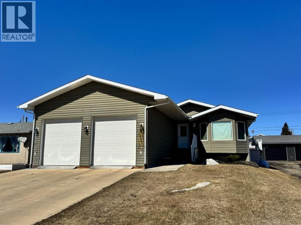 5 bed 3 bath single family at 11404 105 Avenue — $418,000