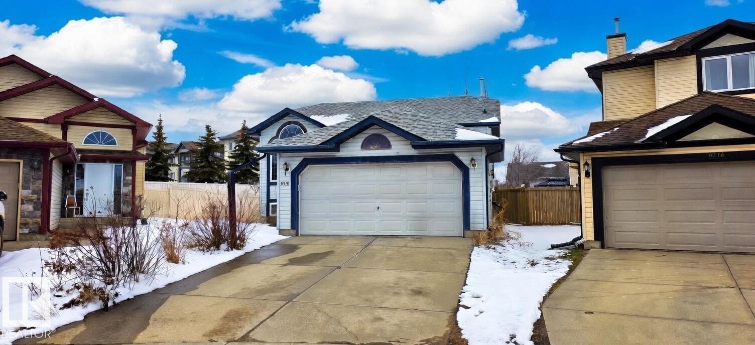 4 bed 3 bath single family at 9218 163 AV NW — $459,999