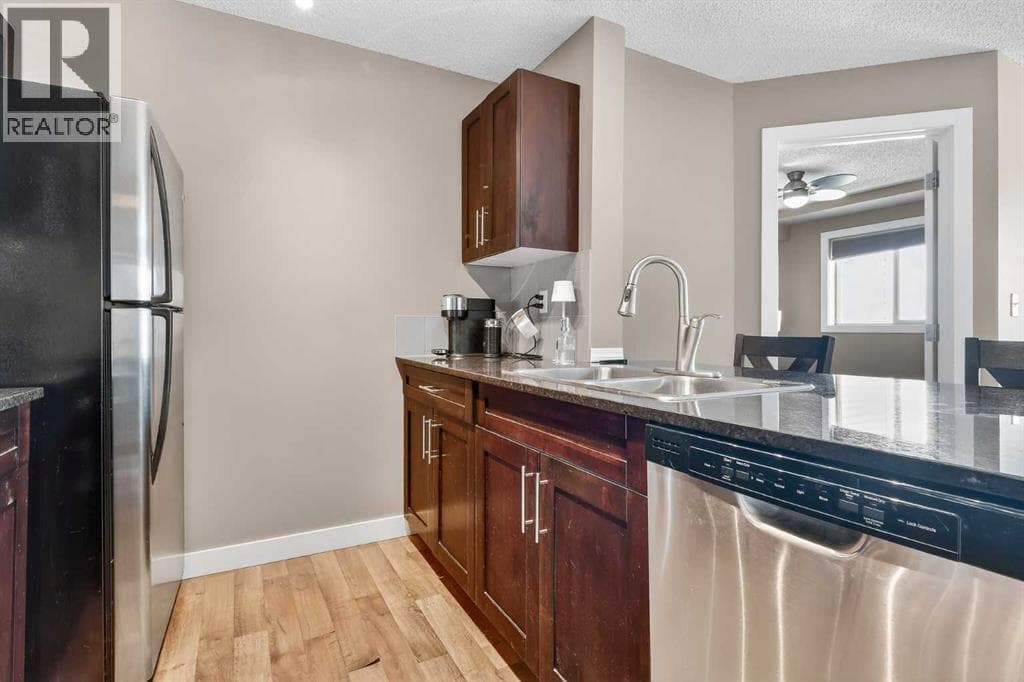 4317, 403 Mackenzie Way SW photo 4