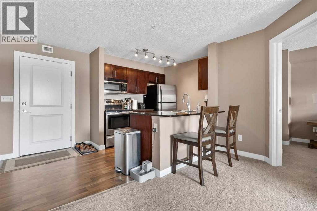 4317, 403 Mackenzie Way SW photo 2