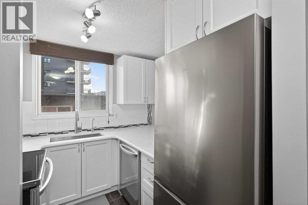 402, 626 15 Avenue SW photo 12