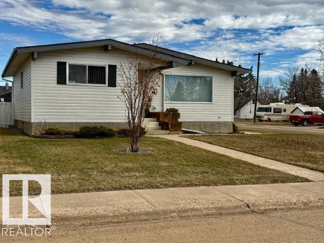 4 bed 3 bath single family at 5302 48 AV — $385,000