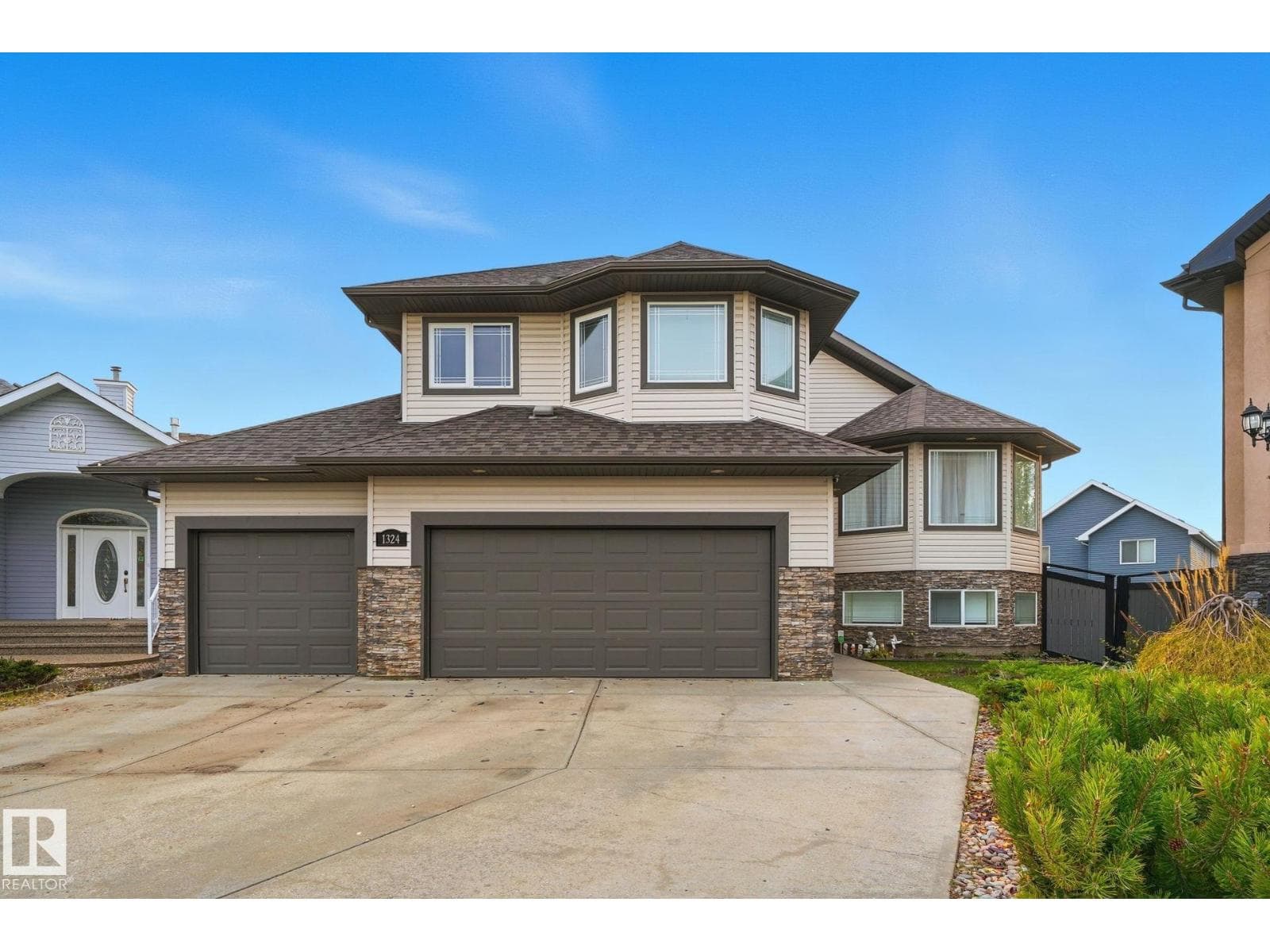 6 bed 4 bath single family at 1324 70 ST SW — $759,000