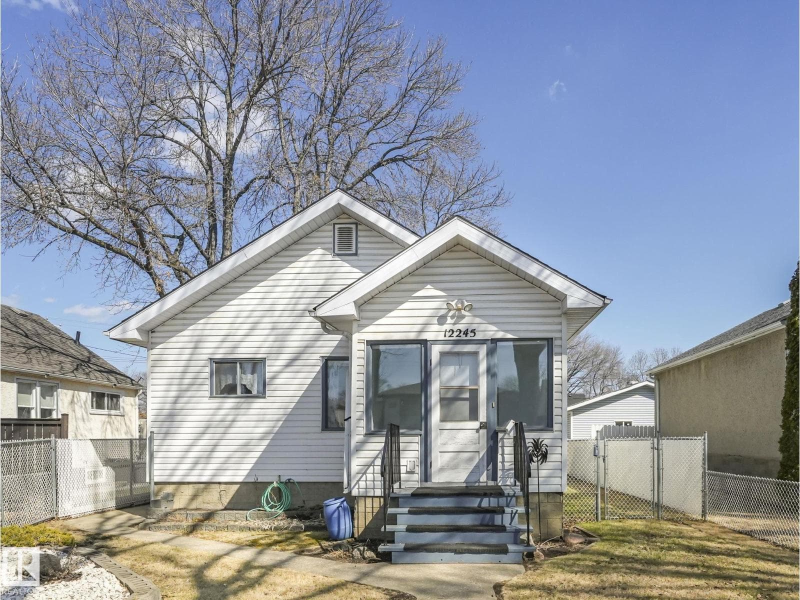 2 bed 1 bath single family at 12245 96 ST NW — $259,900