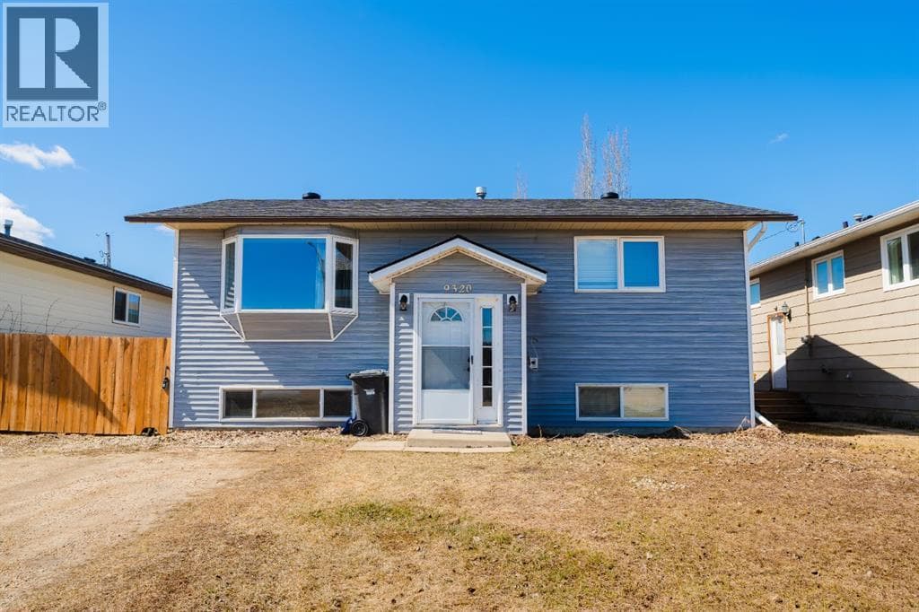 4 bed 2 bath single family at 9320 98 Street — $329,900