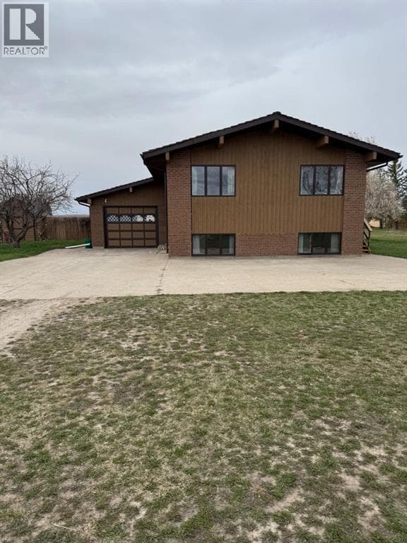 4 bed 2 bath single family at 214015 TWP Rd 52 — $979,900