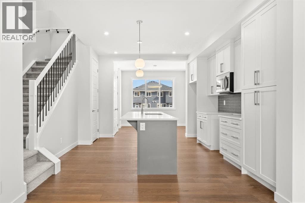 106 Sora Gardens SE photo 3